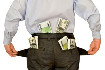 men businessman showing empty pockets hiding behind wads of money