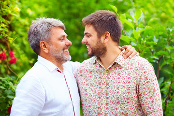 Obraz premium portrait of happy father and son, that are similar in appearance