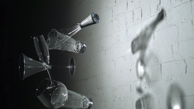 Drinking glasses shattering on the walll shooting with high speed camera, phantom flex.