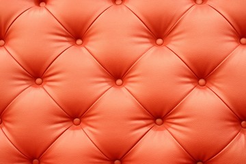 Red leather sofa texture background
