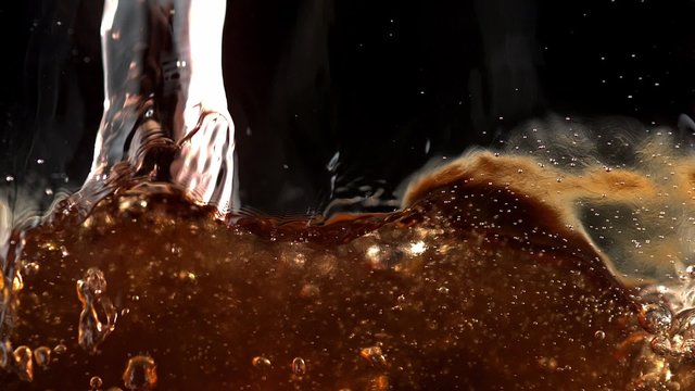 Pouring soft drink into glass shooting with high speed camera, phantom flex.