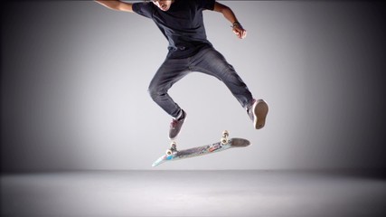 Skater rolling into kickflip trick shooting with high speed camera, phantom flex.
