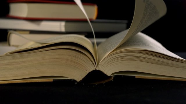 Old book's page turning shooting with high speed camera, phantom flex.