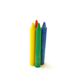 wax crayons standing on white background