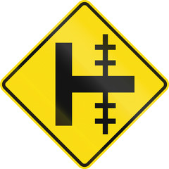 Obraz premium New Zealand road sign - Level crossing on uncontrolled crossroad on right