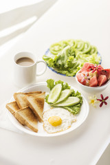 breakfast with egg toast fruit and vegetable salad