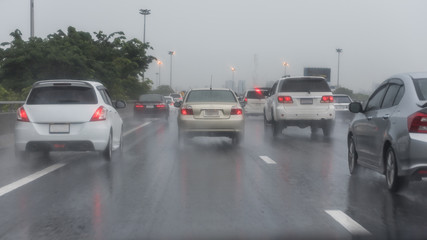 Fototapeta na wymiar traffic jam on express way in rainning day
