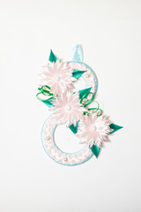 eight number made of  ribbons flowers