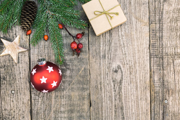 christmas star and decoration over wood background