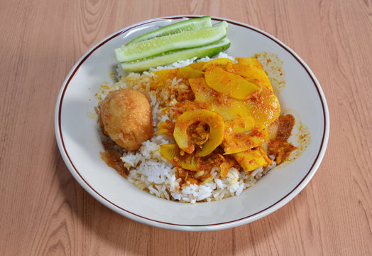 sweet and sour egg with spicy yellow curry bamboo shoot on rice
