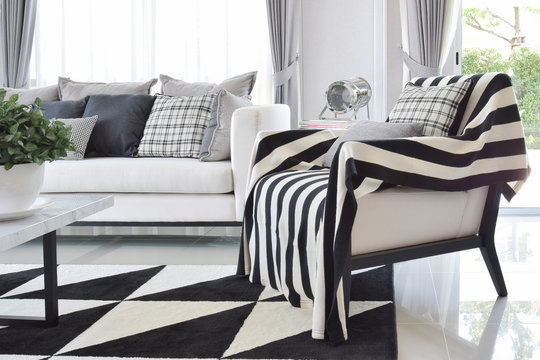 modern living room interior with black and white checked pattern