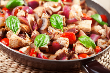 Chicken with onion and cherry tomatos