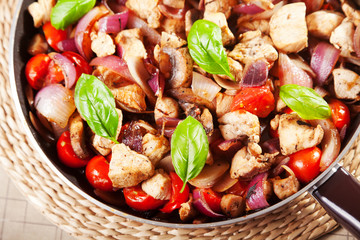 Chicken with onion and cherry tomatos