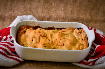 Home made rustic style steak meat pie