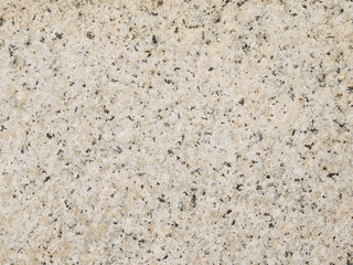 Beige and Brown Granite Surface Texture. Focus across entire surface.