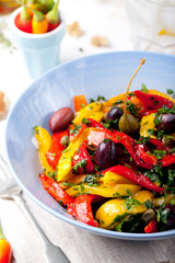 Roasted yellow and red bell pepper salad. Grilled vegetables.