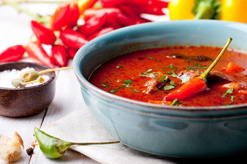 Goulash, beef, tomato, pepper, chili, smoked paprika soup. 