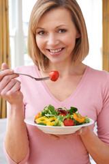 Attractive Woman Eating Healthy Salad