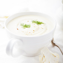 Cauliflower soup with dill and seasoning. Healthy food