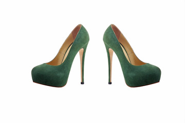 Female high-heeled shoes over white background