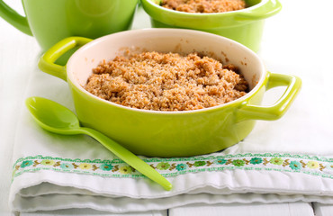 Crumble cakes in ceramic baking tins