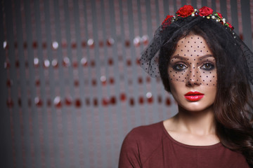 Retro portrait of a beautiful woman. Vintage style. Fashion pho