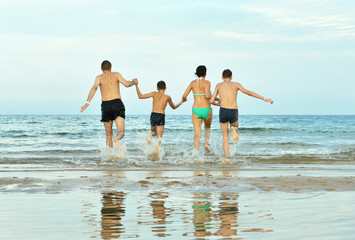 Family at beach in summer