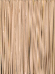 Numerous wood skewers