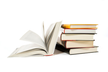 Pile of old books isolated on white