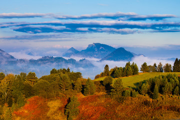 Beautiful Autumn landscape with cloud inversion