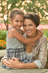 Fototapeta premium girl with mother in park