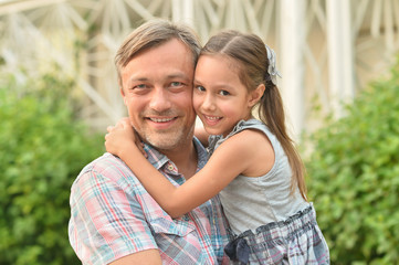 Fototapeta premium father with daughter in summer park