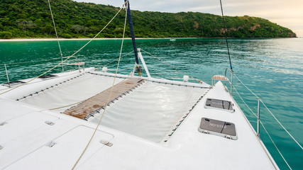 Empty catamaran yacht deck sailing on the sea