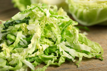 Cut savoy cabbage on cutting board closeup