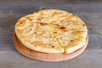 Ossetian pie with cheese and potatoes