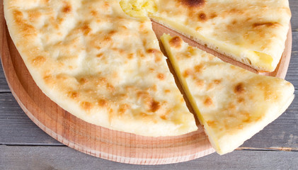 Ossetian pie with cheese and potatoes