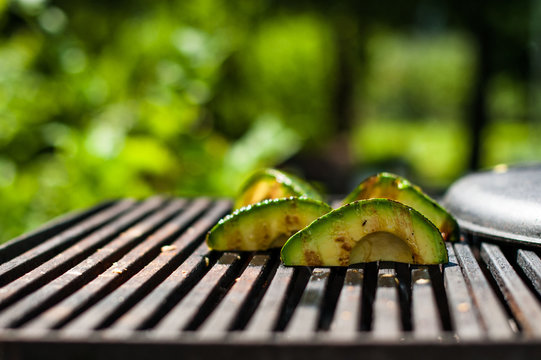 Avocado quarters prepared on the grill