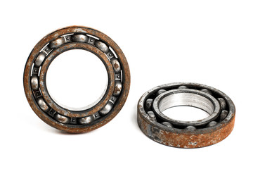 Old and rusty ball bearing, isolated on white background