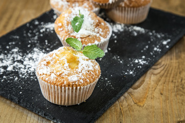 Homemade muffins with star anise, cinnamon and mint