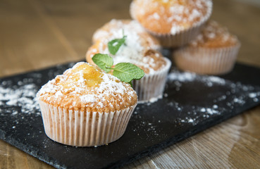 Homemade muffins with star anise, cinnamon and mint