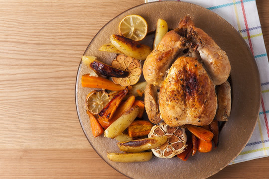  small turkey and vegetables,from above and blank space. christmas dinner or Thanksgiving Day concept