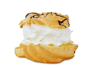 Cream puff with vanilla custard and whipped cream isolated