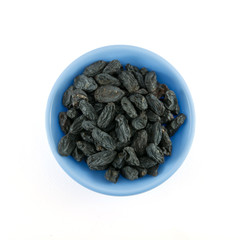 Dried grapes on white background
