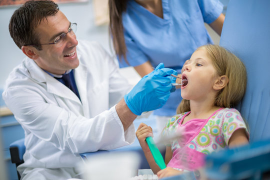 Young girl at dentist in dental clinic