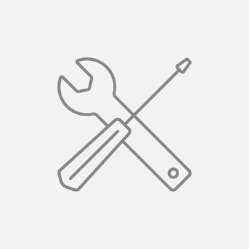 Screwdriver and wrench tools line icon.