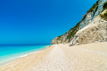 Egremni beach, Lefkada island, Greece. Large and long beach with turquoise water on the island of Lefkada in Greece - obrazy, fototapety, plakaty