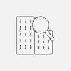 Condominium and magnifying glass line icon.