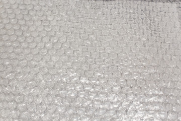 Clicking plastic film with bubbles