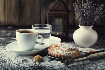 Bun with cottage cheese and coffee.