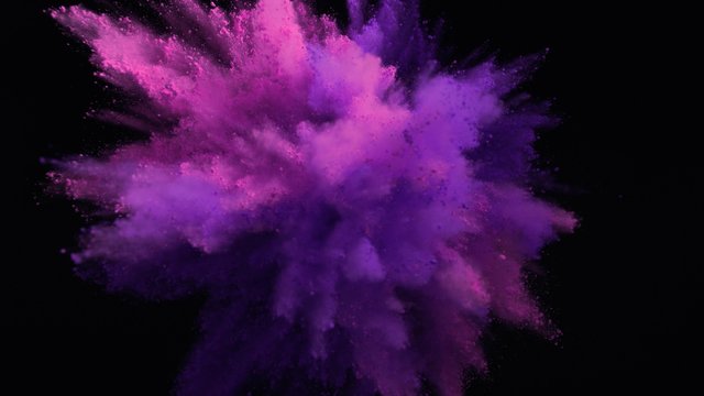 Powder exploding against black background. Shot with high speed camera, phantom flex 4K.  Slow Motion. Unedited version is included at the end of clip.